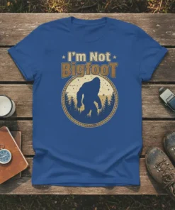 T-shirt with "I'm Not Bigfoot" text and a Bigfoot silhouette in a forest circle design