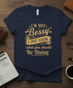 Gold text "I'm Not Bossy I Just Know What You Should Be Doing" on a navy blue t-shirt, featuring a