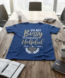 T-shirt with the quote "I'm Not Bossy I'm Aggressively Helpful" in gold and leopard print, featuring gears graphic