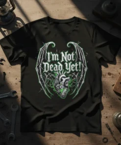 Black t-shirt with "I'm Not Dead Yet!" text above a detailed gothic heart with gears and wings