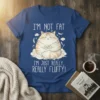Graphic tee with "I'm Not Fat I'm Just Really Fluffy" text and a cute, plump cat sitting on clouds