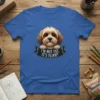 I'm Not Fat, It's Floof! text on a ribbon with a cute dog graphic above, on a blue t-shirt