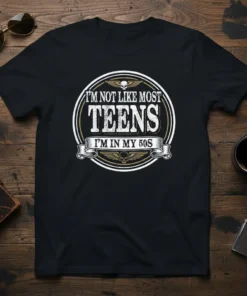 Black t-shirt with white and gold text reading "I'm Not Like Most Teens I'm In My 50s" in a circular