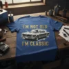 Blue t-shirt with gold text "I'm Not Old I'm Classic" and a vintage car graphic