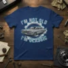 I'm Not Old I'm Classic text with a vintage silver car graphic and gear design on a navy blue t-shirt