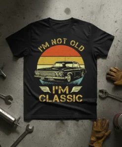 I'm Not Old I'm Classic t-shirt design featuring a vintage car silhouette against a retro sunset graphic