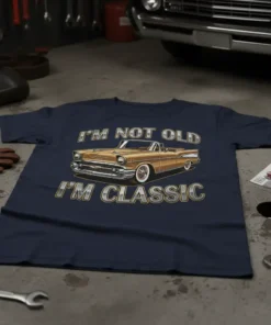 I'm Not Old I'm Classic text with a vintage gold convertible car graphic on a navy blue t-shirt
