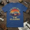 I'm Not Old I'm Classic vintage car design with retro automobile graphic and sunset background on a blue t-shirt