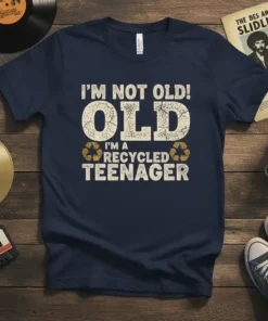 Navy t-shirt with "I'm Not Old! OLD I'M A RECYCLED TEENAGER" text in distressed white and yellow, featuring recycling symbols
