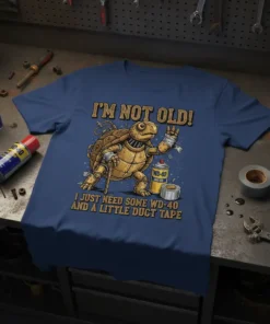 Turtle wearing bandages and holding a cane, with WD-40 and duct tape, text reads "I'm Not Old I Just Need