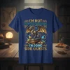 I'm Not Procrastinating I'm Doing Side Quests t-shirt with a dragon on books. Features fantasy elements and bold text