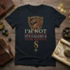 I'm Not Procrastinating It's Called A Side Quest T-Shirt with a dragon shield graphic