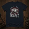 I'm Not Scared text above a roaring lion with bat wings on a navy t-shirt, gothic fantasy design
