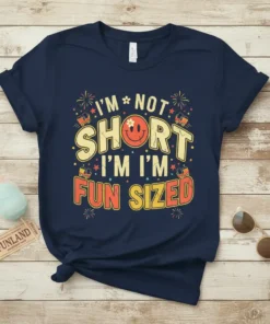 Retro graphic tee with text "I'm Not Short I'm Fun Sized" and a smiley face graphic