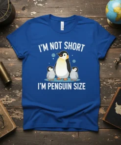 Blue t-shirt with "I'm Not Short I'm Penguin Size" text and a graphic of a large penguin with two smaller