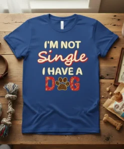 I'm Not Single I Have A Dog text with a paw print graphic on a royal blue t-shirt
