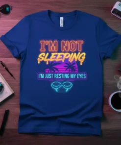 Neon retro graphic t-shirt with the text "I'm Not Sleeping I'm Just Resting My Eyes" and sunglasses illustration