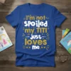 I'm not spoiled my TITI just loves me quote on a royal blue t-shirt, featuring white and gold glitter typography