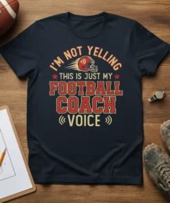 I'm Not Yelling This Is Just My Football Coach Voice t-shirt with football helmet graphic and red distressed text