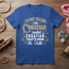 T-shirt with "I'm Not Yelling I'm Croatian That's How We Talk" text, featuring nautical graphics like anchors and a boat