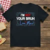 I'm Not Your Bruh Love Mom text design with circuit board elements and heart accents on a black t-shirt