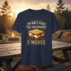I'm Only Here For The S'mores S'mores text with a graphic of a s'more on a navy t-shirt, camping theme