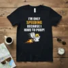 Black t-shirt with white and yellow text "I'm Only Speeding Because I Have To Poop!" and a cartoon toilet with