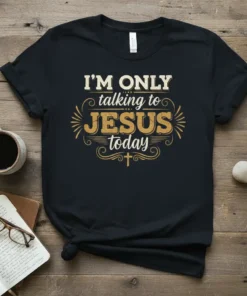 Christian t-shirt with "I'm Only Talking To Jesus Today" text in vintage distressed font, featuring a small cross