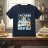 I'm Pibble Wash My Belly text with cute puppies in a bathtub graphic on a navy t-shirt