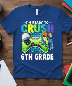 I'm Ready To Crush 6th Grade t-shirt with a green video game controller and school supplies graphic