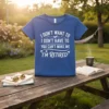Blue t-shirt with white distressed text: "I DON'T WANT TO I DON'T HAVE TO YOU CAN'T MAKE ME I'M RETIRED"
