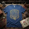 I'm Right On Top Of That Rose quote on a blue t-shirt with ornate floral border and rose graphic