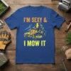I'm Sexy & I Mow It humorous quote t-shirt with a graphic of a yellow zero-turn mower