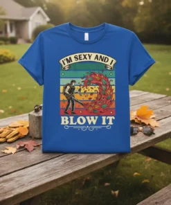 I'm Sexy and I Blow It funny leaf blower t-shirt design with a person using a blower and colorful leaves