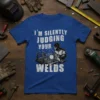Blue t-shirt with white text "I'm Silently Judging Your Welds" and a graphic of a welder working on metal