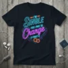 Neon sign graphic t-shirt with the text "I'M SINGLE FEEL FREE TO Change " and two interlocking rings
