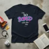 Navy t-shirt with "i'm SO BORED with this day..." text in graffiti-style font and dripping paint effect