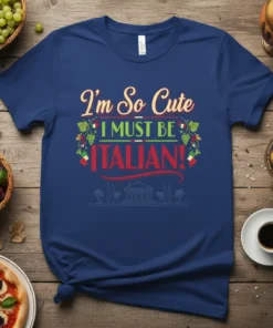 Navy blue t-shirt with the text "I'm So Cute I MUST BE ITALIAN!" in decorative fonts, surrounded by grape vines