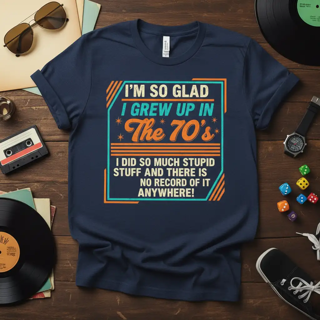 I'm So Glad I Grew Up In The 70's quote on a navy t-shirt with retro graphics