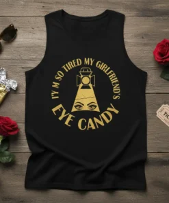Black tank top with gold text "I'm So Tired My Girlfriend's Eye Candy" and a graphic of eyes within a
