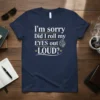 Navy blue t-shirt with white and gold text: "I'm sorry Did I roll my EYES out LOUD?" featuring dice and