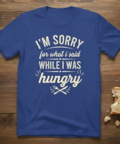 I'M SORRY for what i said WHILE I WAS hungry text in distressed vintage style on a blue t-shirt, with