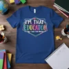 I'm That Educator They Told You About quote on a royal blue t-shirt with colorful, galaxy-inspired text