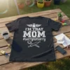 Black t-shirt with white distressed text "I'M THAT MOM #sorrynotsorry" and graphics of a spoon and rolling pin