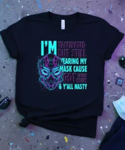 T-shirt with neon text "I'm Vaccinated But Still Wearing My Mask Cause Got Trust Issues & Y'all Nasty" and a