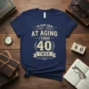I'm Very Good At Aging I Turned 40 Twice quote on a navy blue t-shirt, vintage distressed typography, celebration graphic