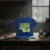 Blue t-shirt with yellow text "I'M WITH STUPID" and a pointing hand graphic