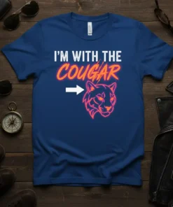 I'm With The Cougar graphic t-shirt with bold white text and a neon cougar illustration