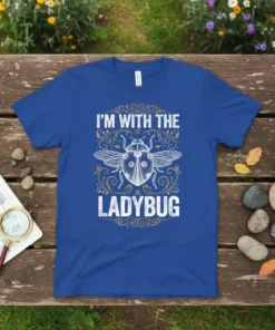 I'm With The Ladybug t-shirt design with a detailed white ladybug graphic and decorative border