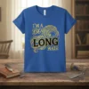 I'm a boy with long hair quote design with flowing golden hair illustration on a blue t-shirt